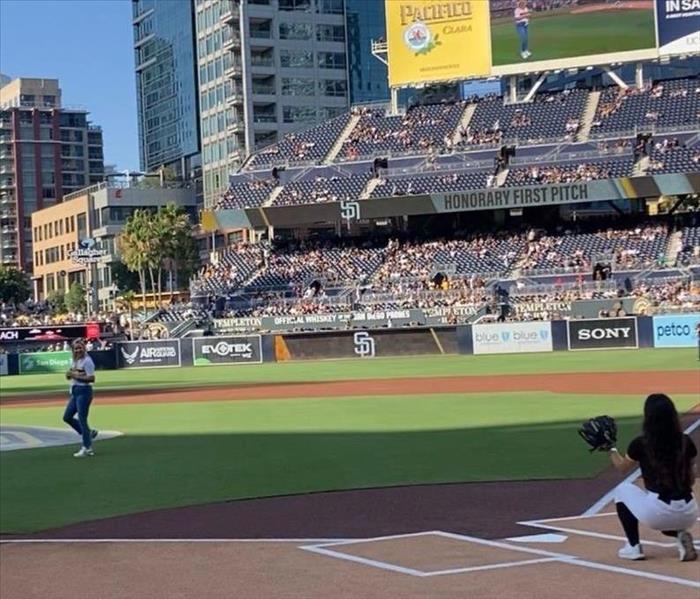 Lisa Sussman, owner of franchise throws out first pitch at Padres game 