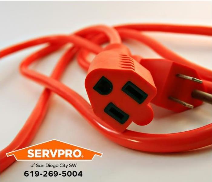 An orange extension cord is shown.
