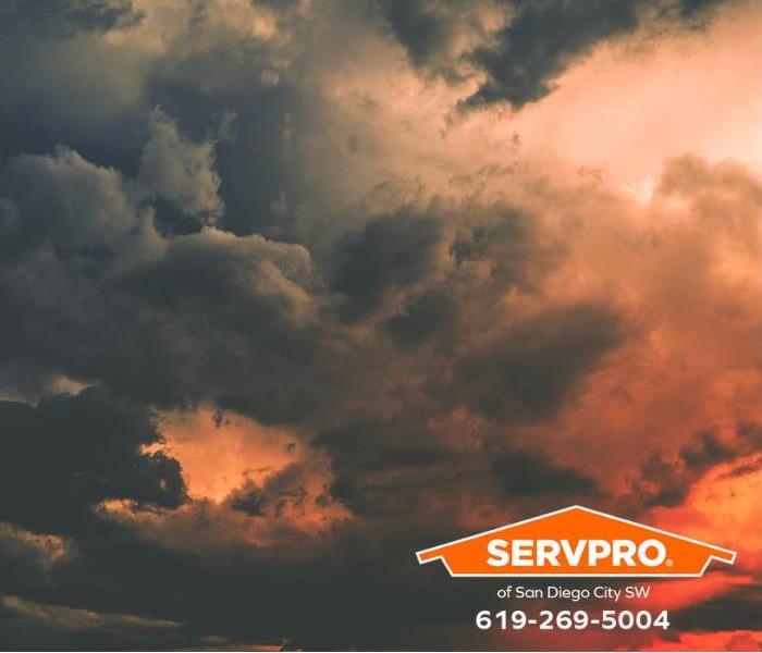 Storm clouds gather in the sky.