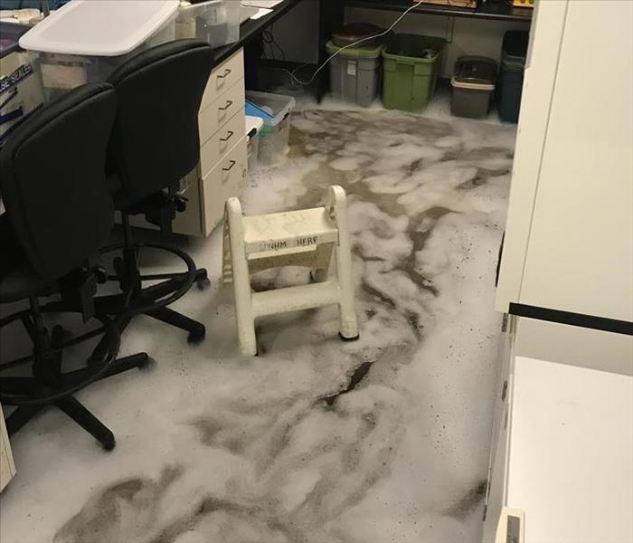 A photo of a building with bubbles on the floor.
